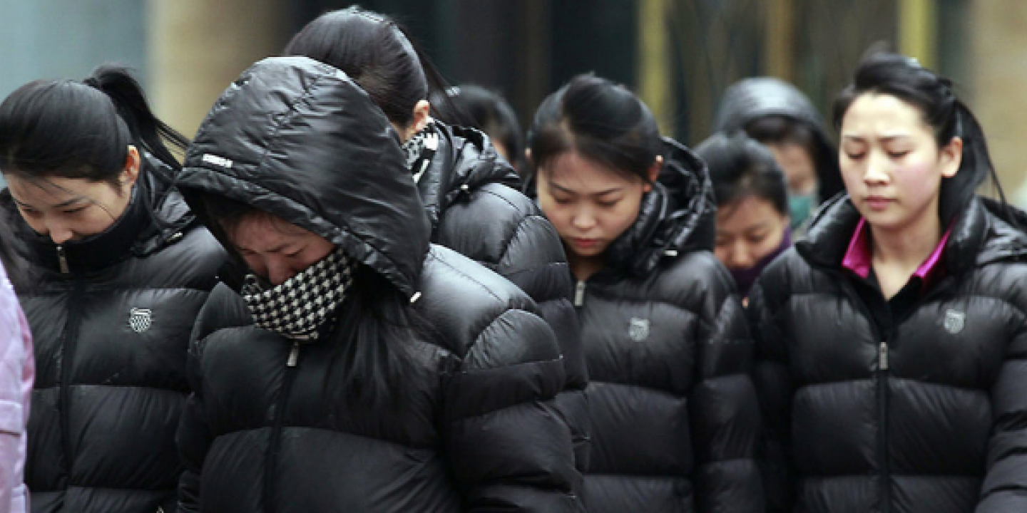 5c5d9ec 1708771537583 north korean women with their heads down